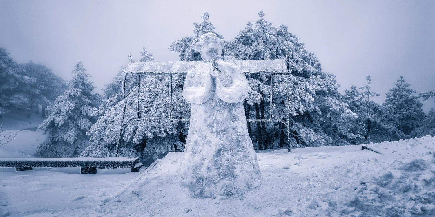A snowman greets visitors on Huangshan (i.e., Yellow Mountain) in Eastern China during the depths of winter.