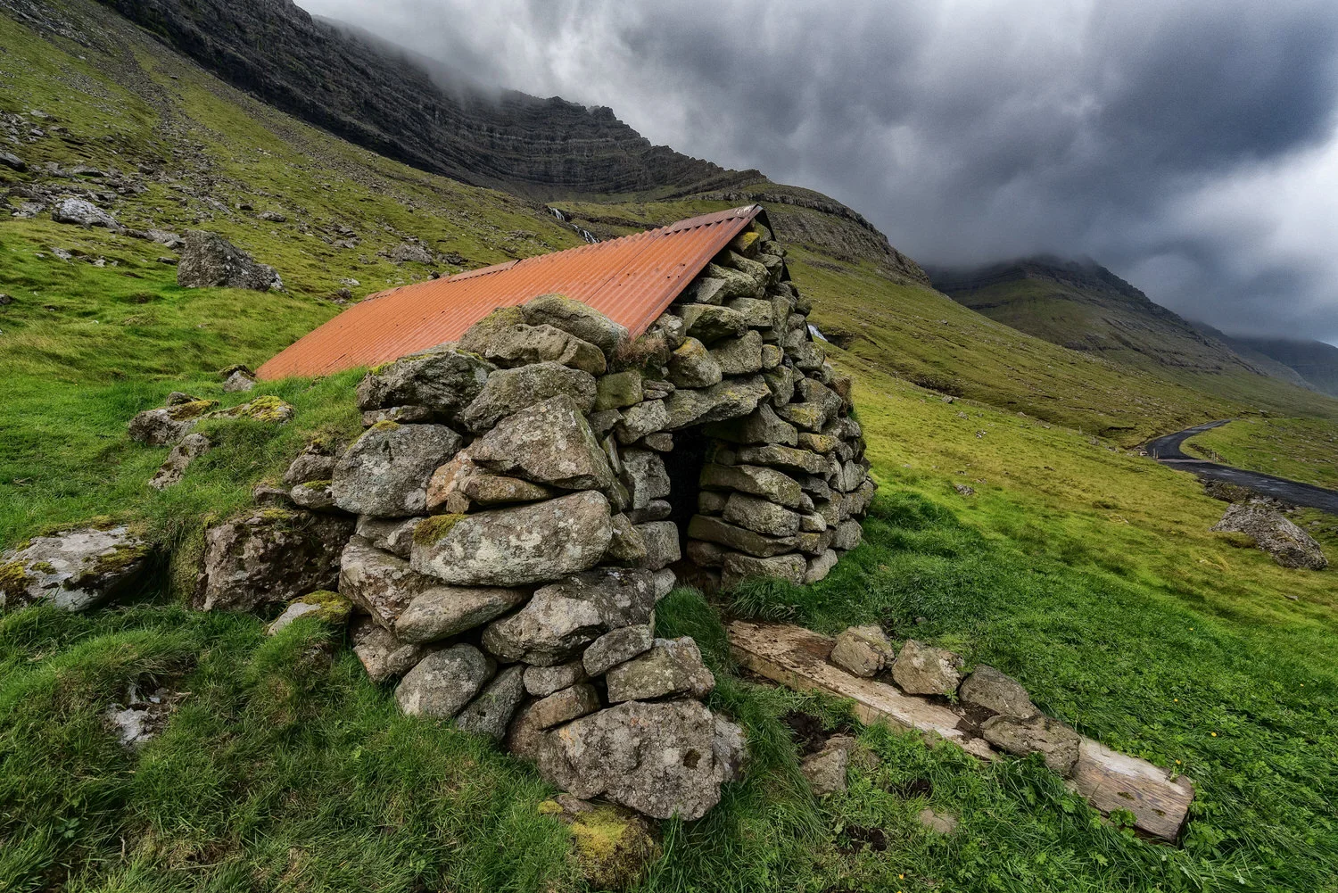 A traditional sheep shelter on the island of Bordoy in the Faroe Islands .