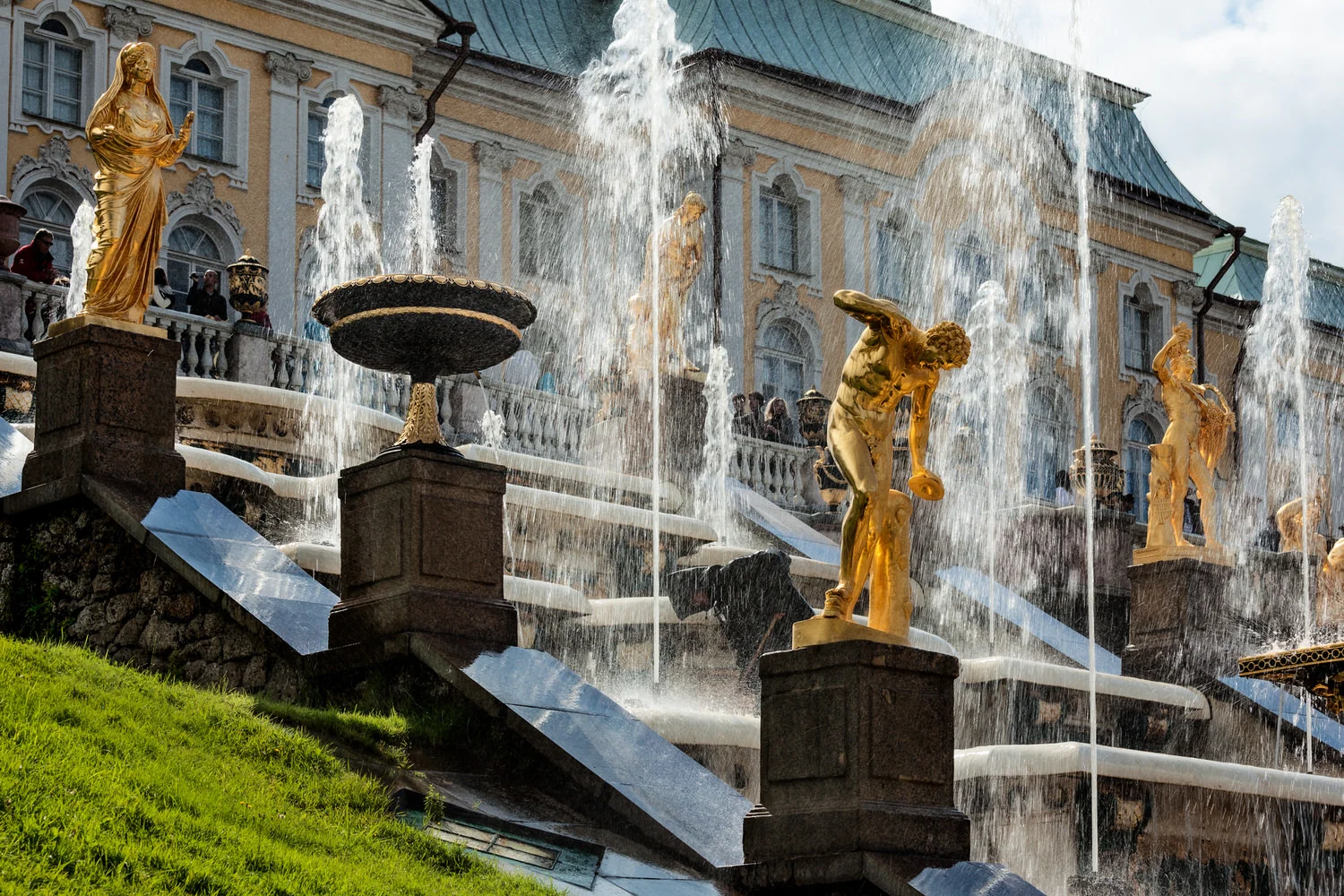 Water fountains and statues at the fabulous Grand Cascade at Peterhof Palace near St. Petersburg, Russia.
