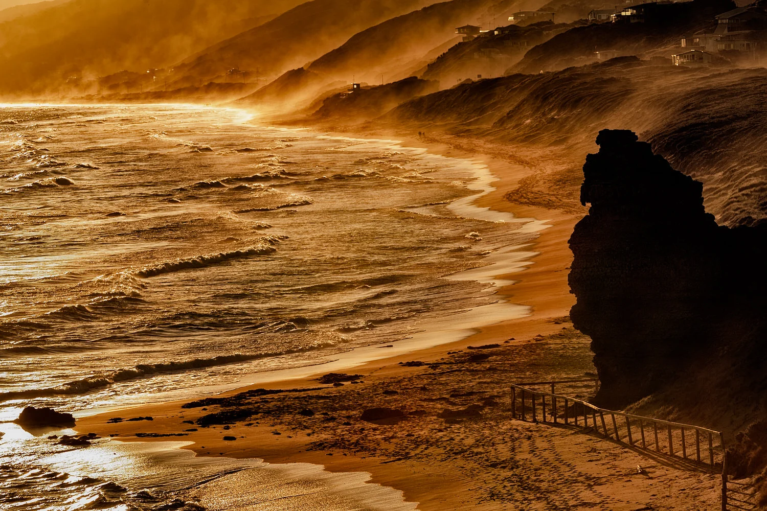 Sunset nature photo of surf and mist at Aireys Inlet, Australia.