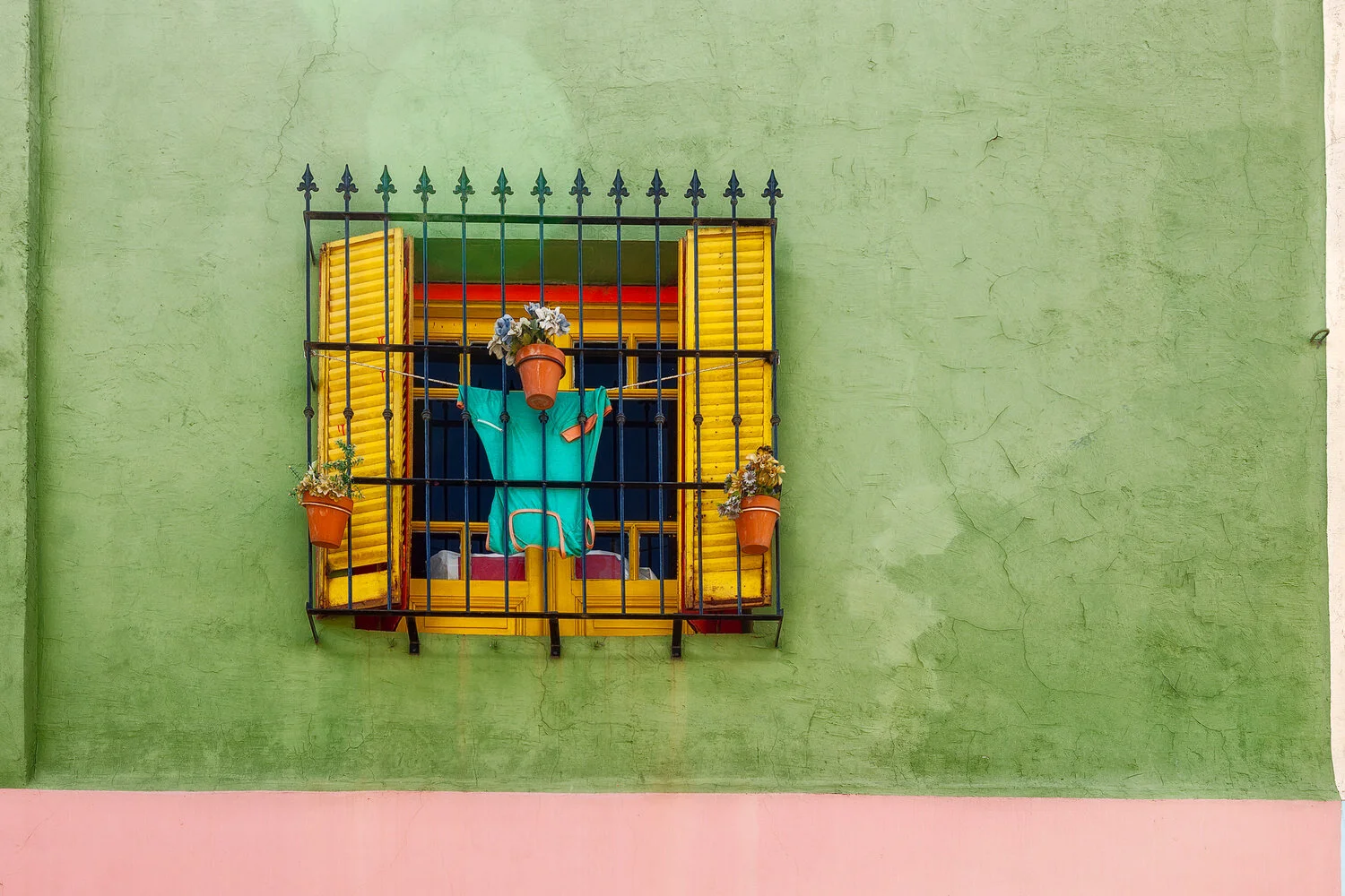 Find purpose in creativity. Window, La Boca. Link to Travel Resources page.