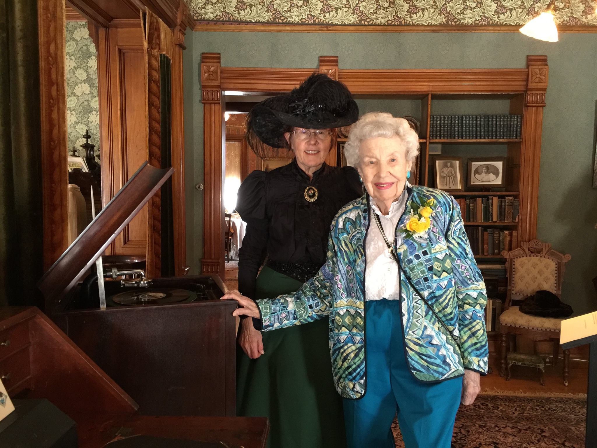   Avery House docent Karol Harding (l.) poses with Margaret Brown (r.) during Margaret's tour of the Margaret Brown Collection exhibit at the Avery House.  