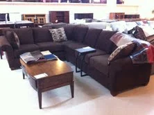 sectional with pillows and coffee table.jpg