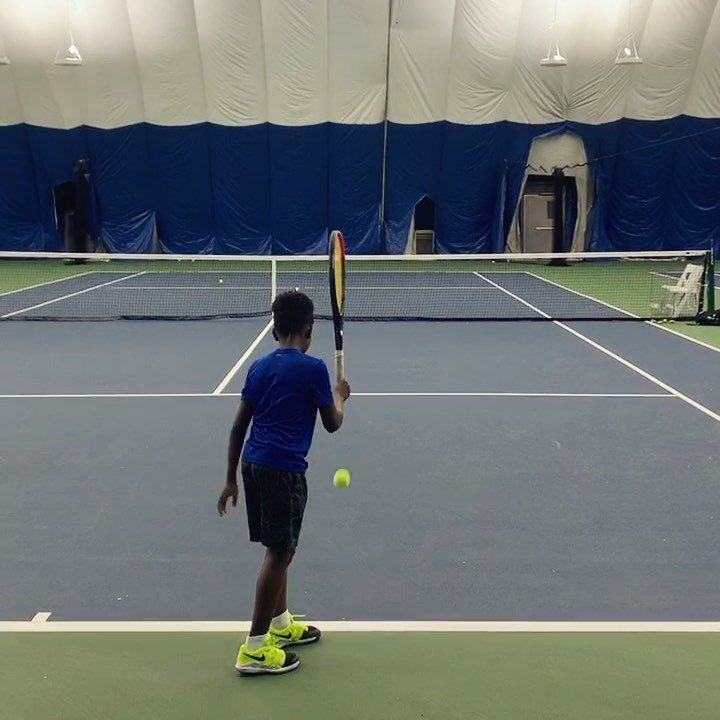 Teaching 11-yr-old John how to hit a kick serve but first he wants to show me his trick serve!!