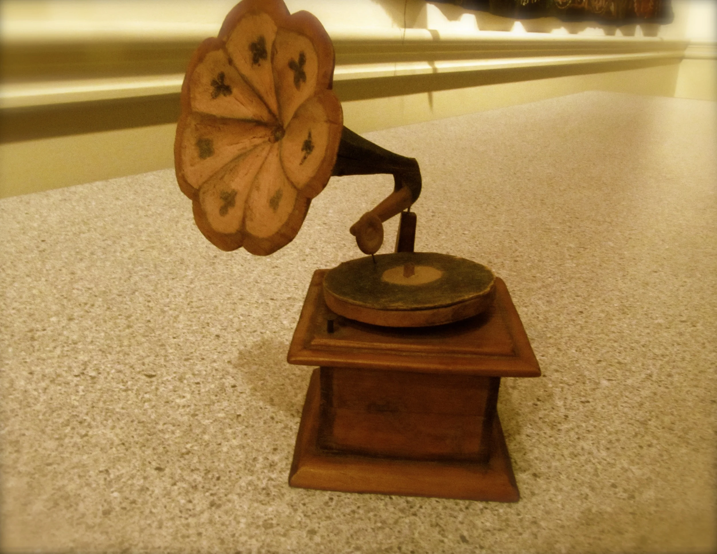  One of Lula's brother's, Willy, made this woodcarving of a phonograph for his school teacher in Jefferson when he was 17 years old in 1912. His school teacher happened to be the mother of the genealogist who was helping Ed to research his family. She had treasured the carving for many years, and now Ed treasures it.