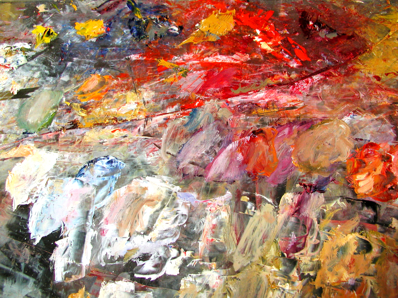 An old glass palette surface. Few colors can create a myriad of possibilities. 