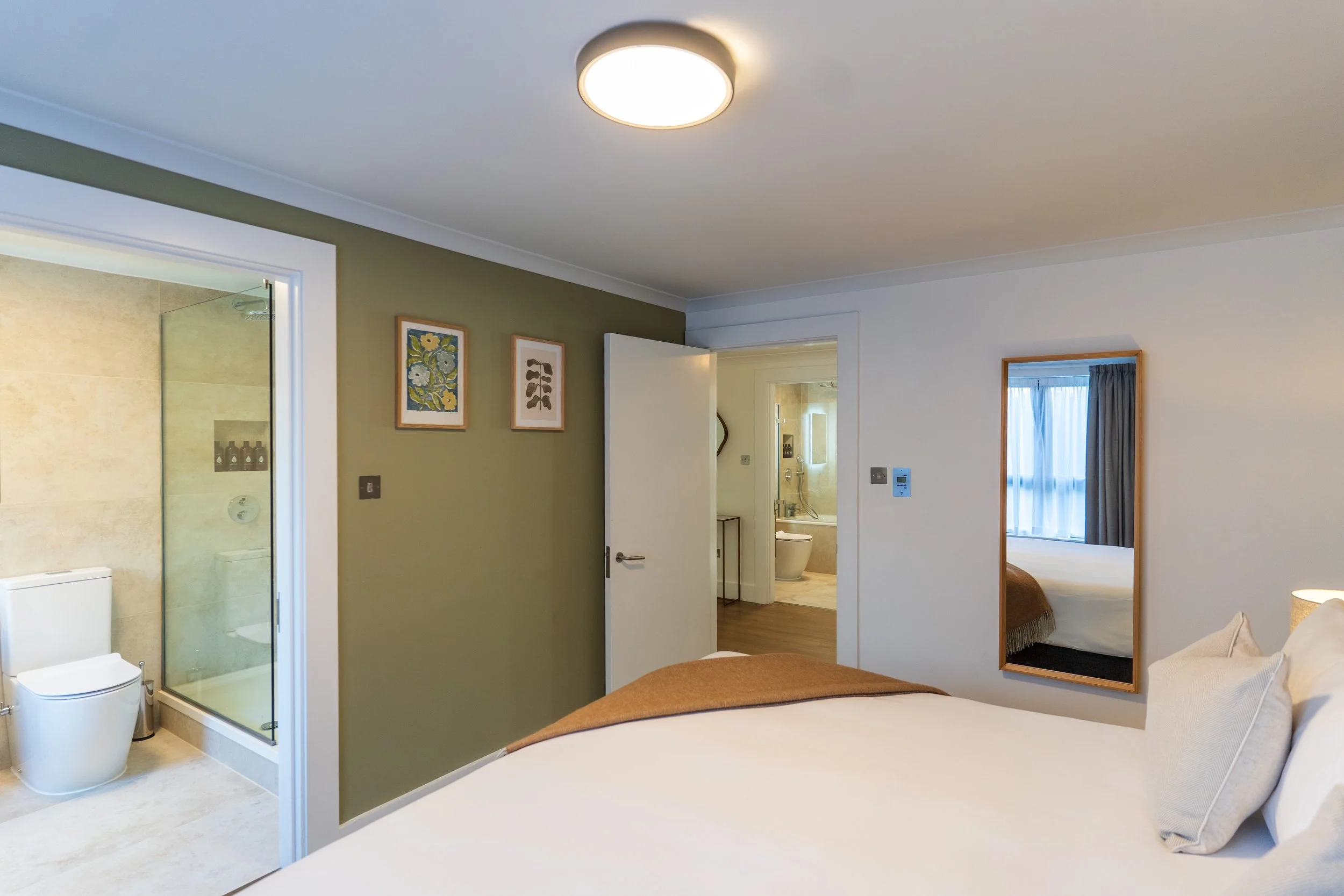 DLX3 - Bed - Corrdior - Bathroom.jpg