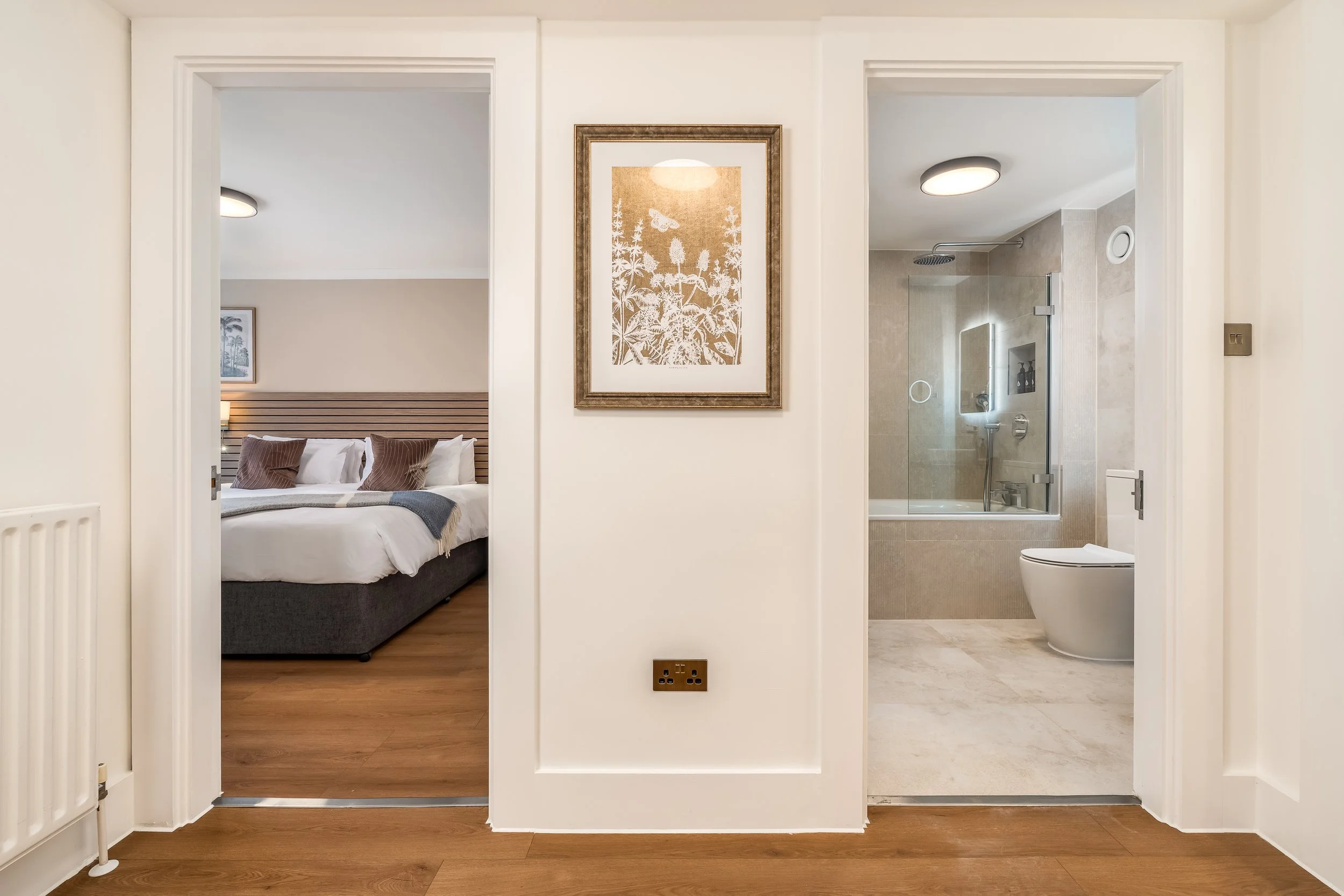 Premium 1 Bed - Side View - Bed & Bathroom.jpg