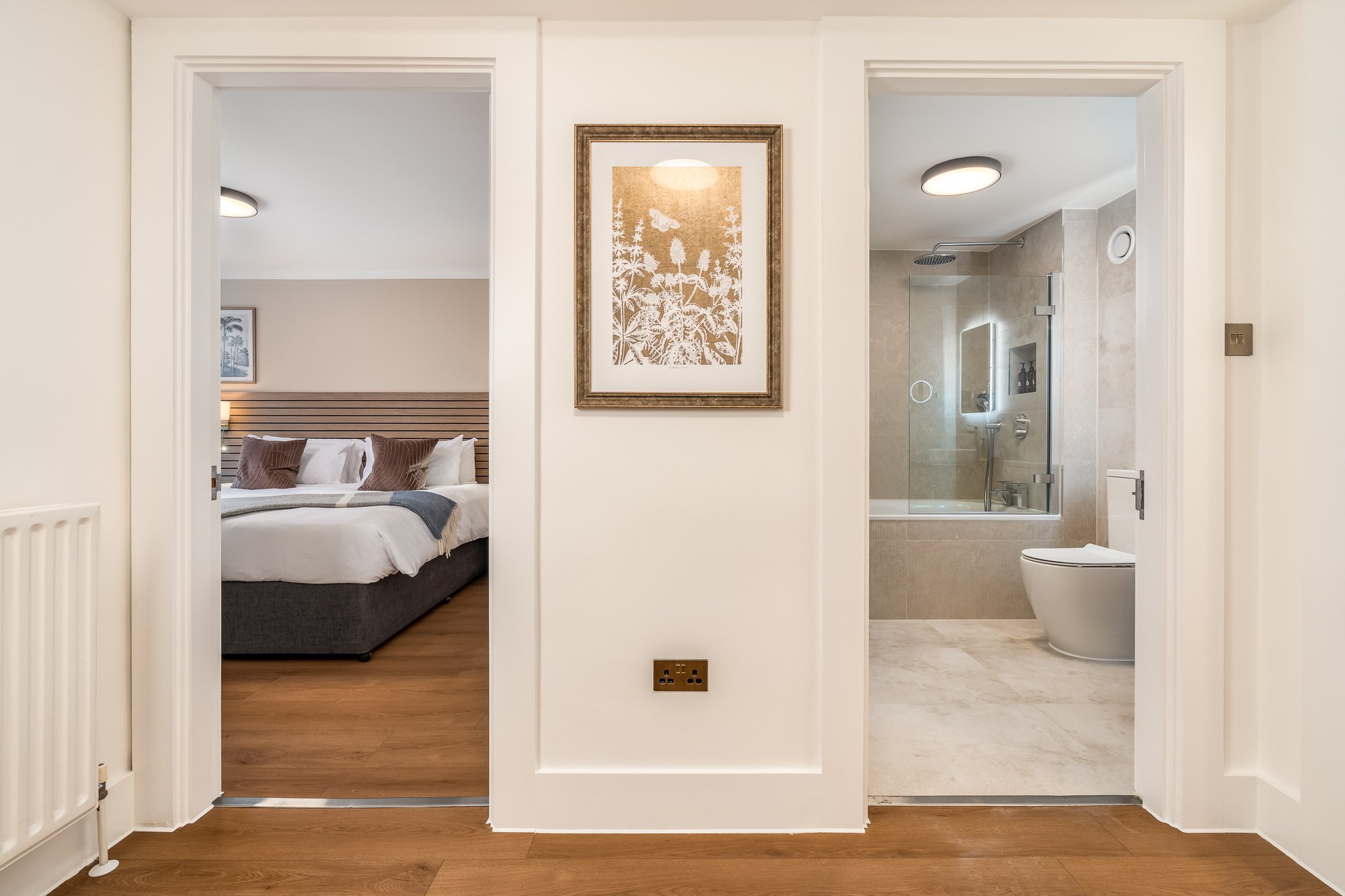 Premium 1 Bed - Side View - Bed & Bathroom.jpg