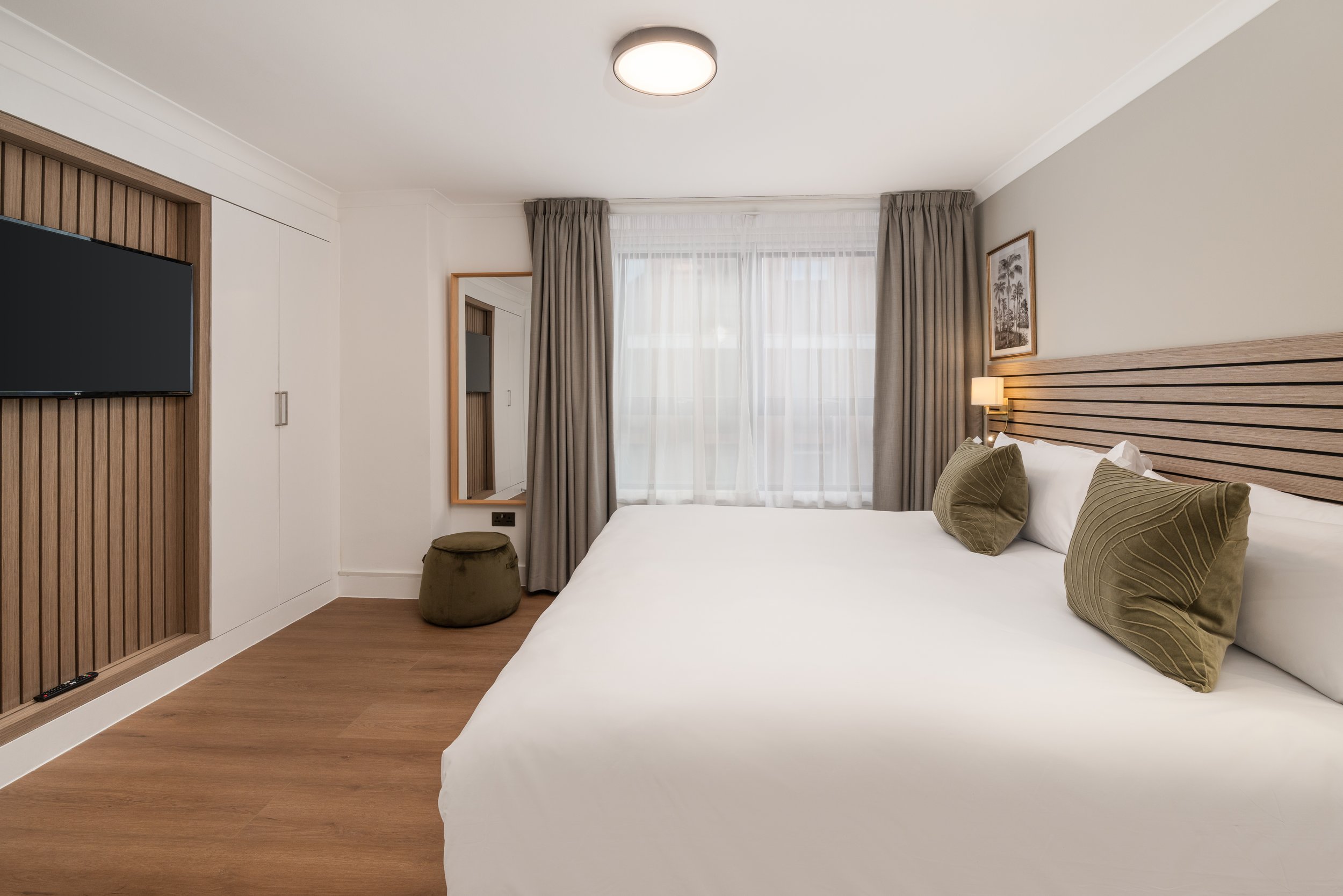 DLX2E - Bedroom Side with TV.jpg