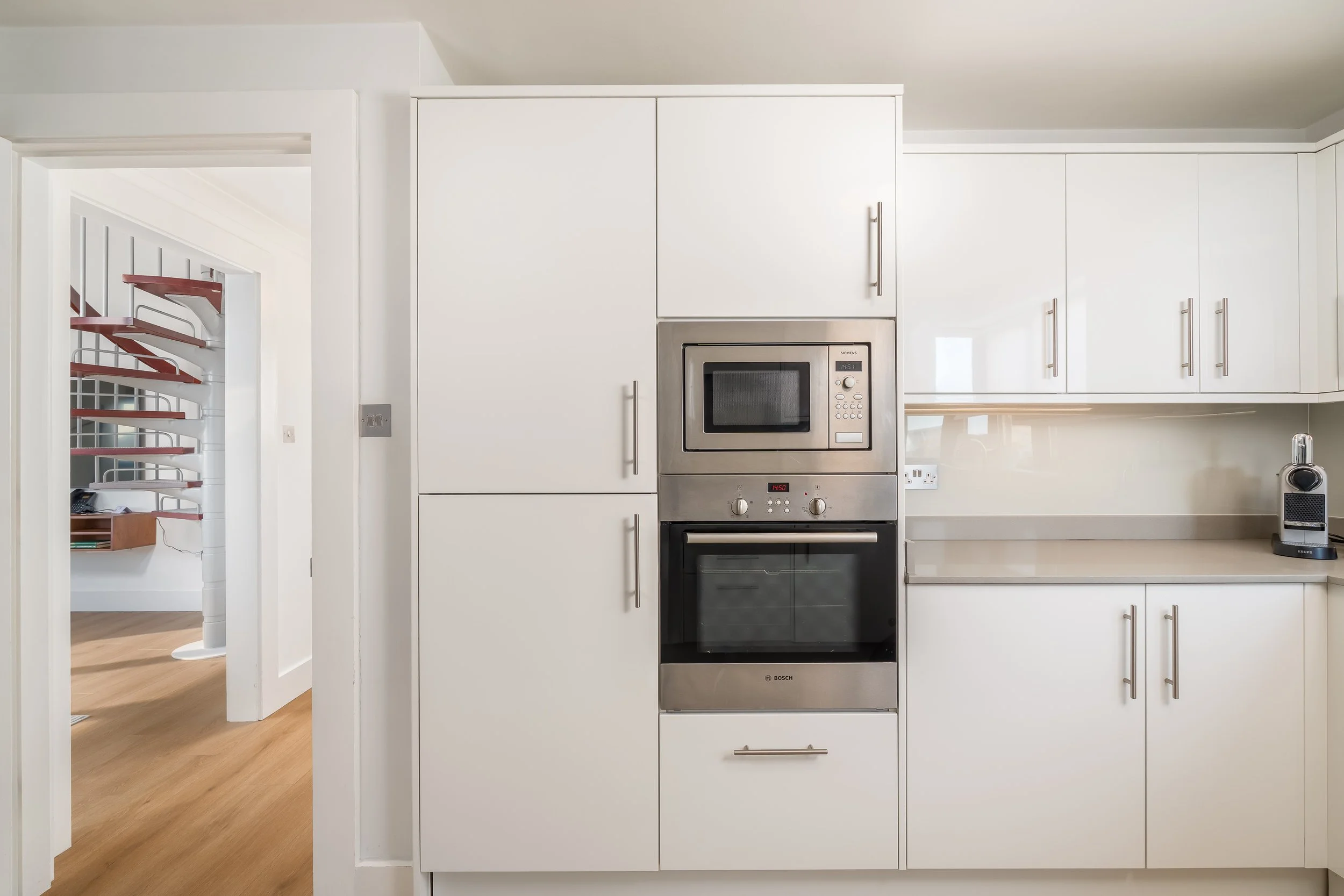 MZ2 - Kitchen - Side with Staircase.jpg
