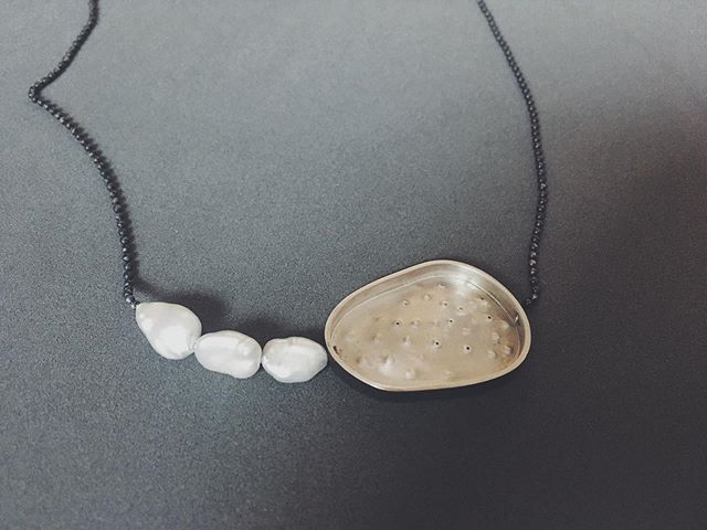 New necklace. Inspired by ocean shapes, algae and sea urchins. Sterling silver and pearls. Really liking the asymmetrical look of it and how comfortable it is to wear.