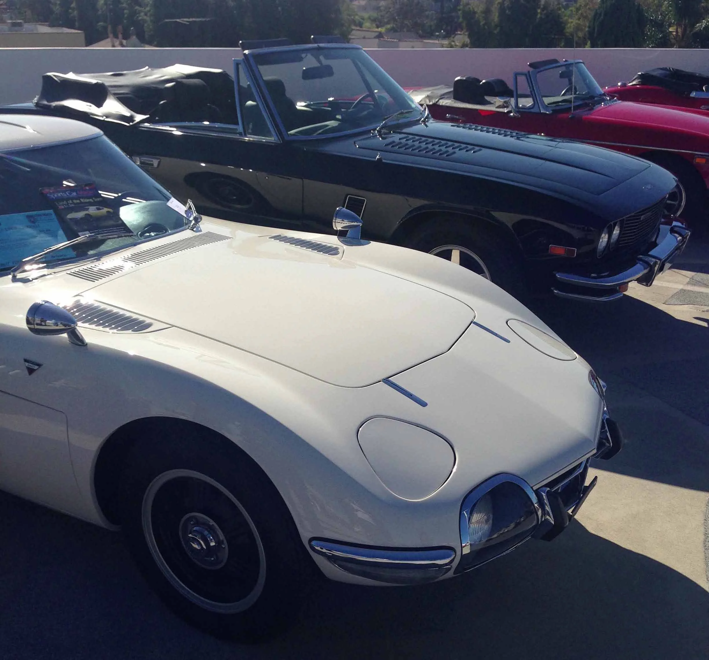 1967 Toyota 2000GT (white), and 1976 Jensen Interceptor Series III Convertible 