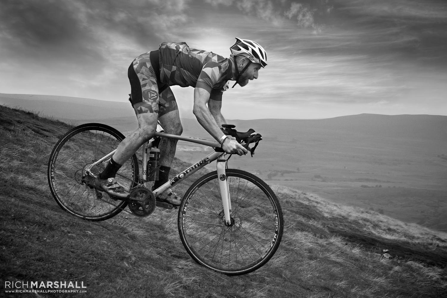 Drama added via a Sleeklens sky dropped in behind the rider. 