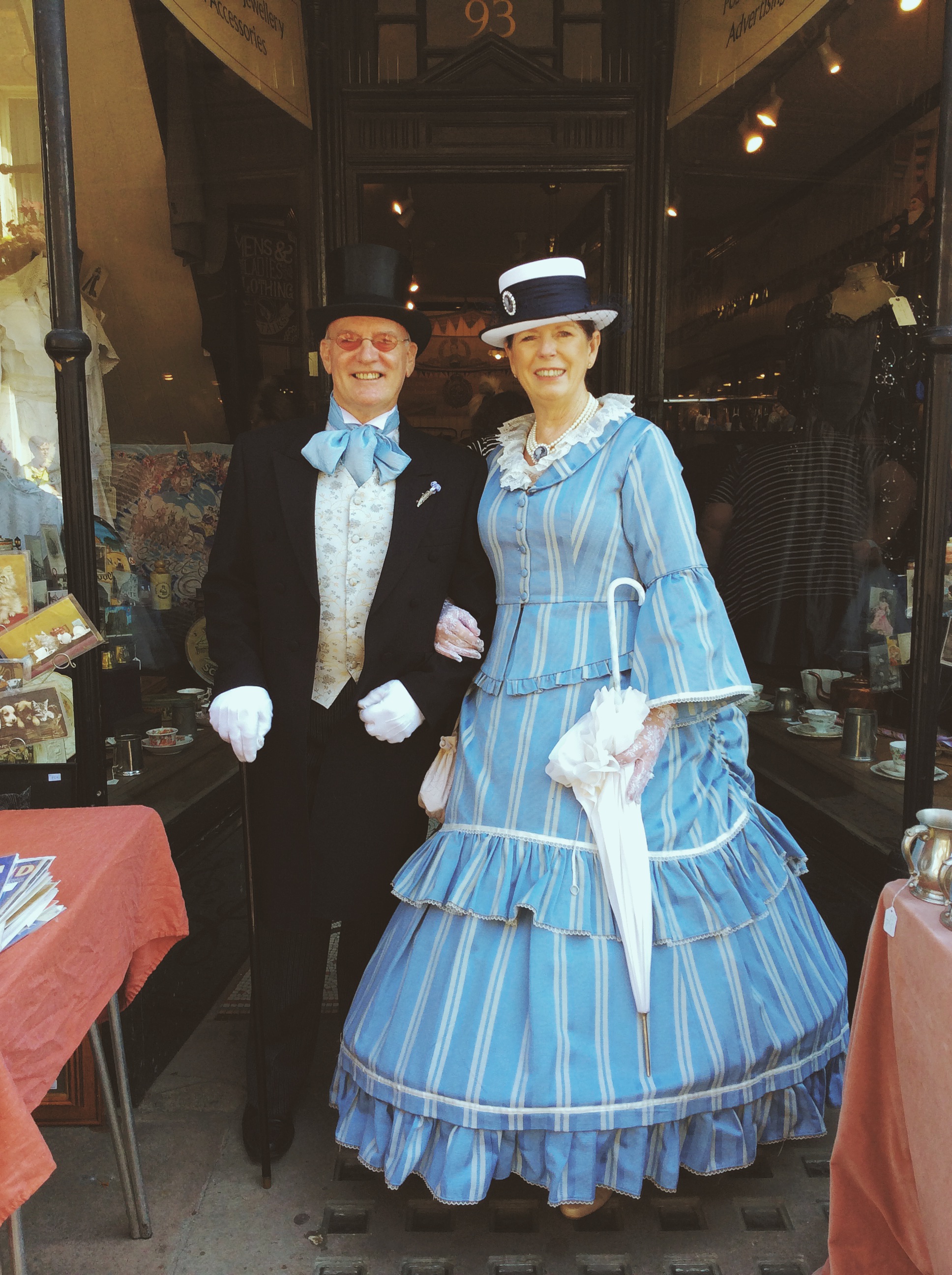 It's that beautifully dressed lady again and her impeccably turned out husband!