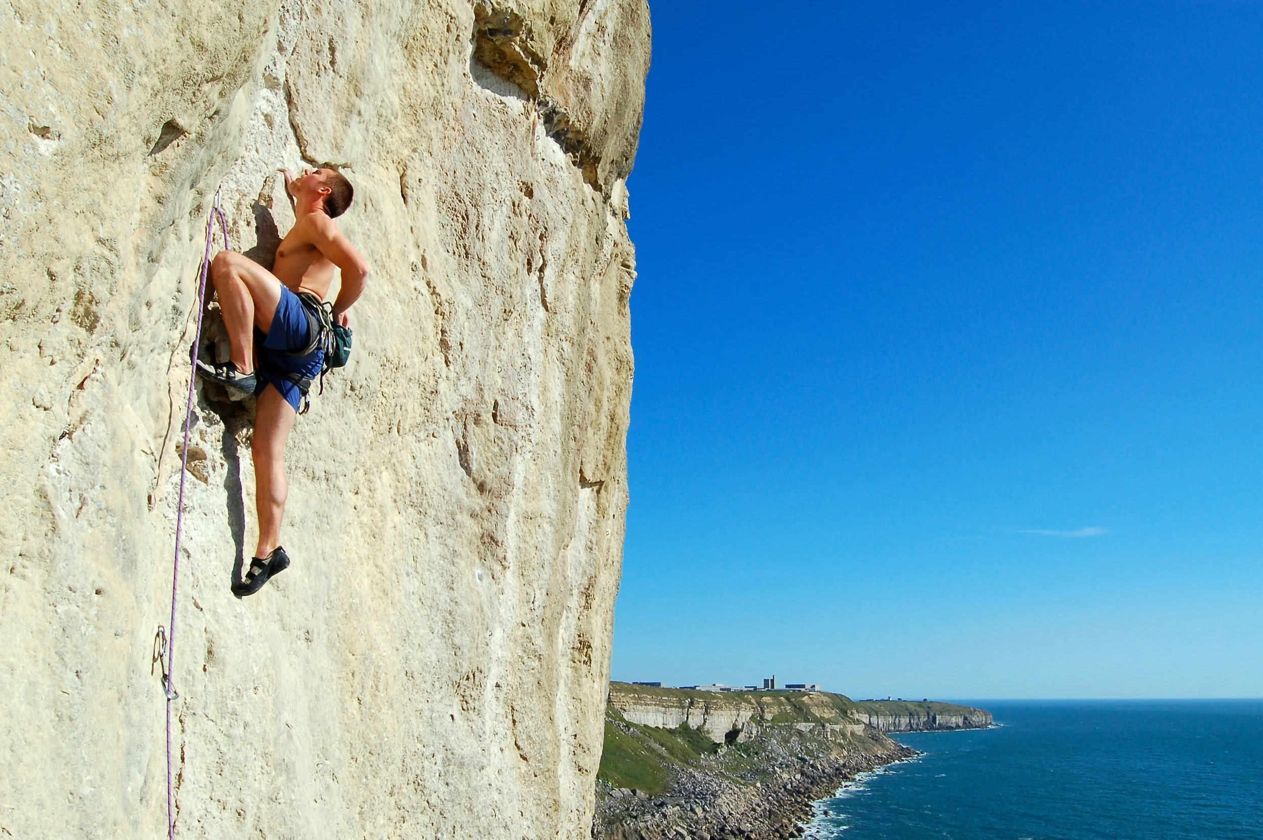 John Maskell eyeing the crux, Portland, Dorset
