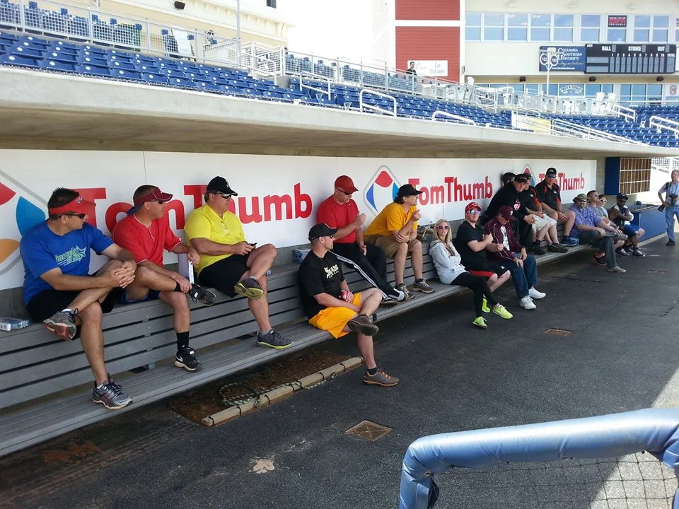 Coaches getting great advice on making their players better from the Pro Cuffs pros!