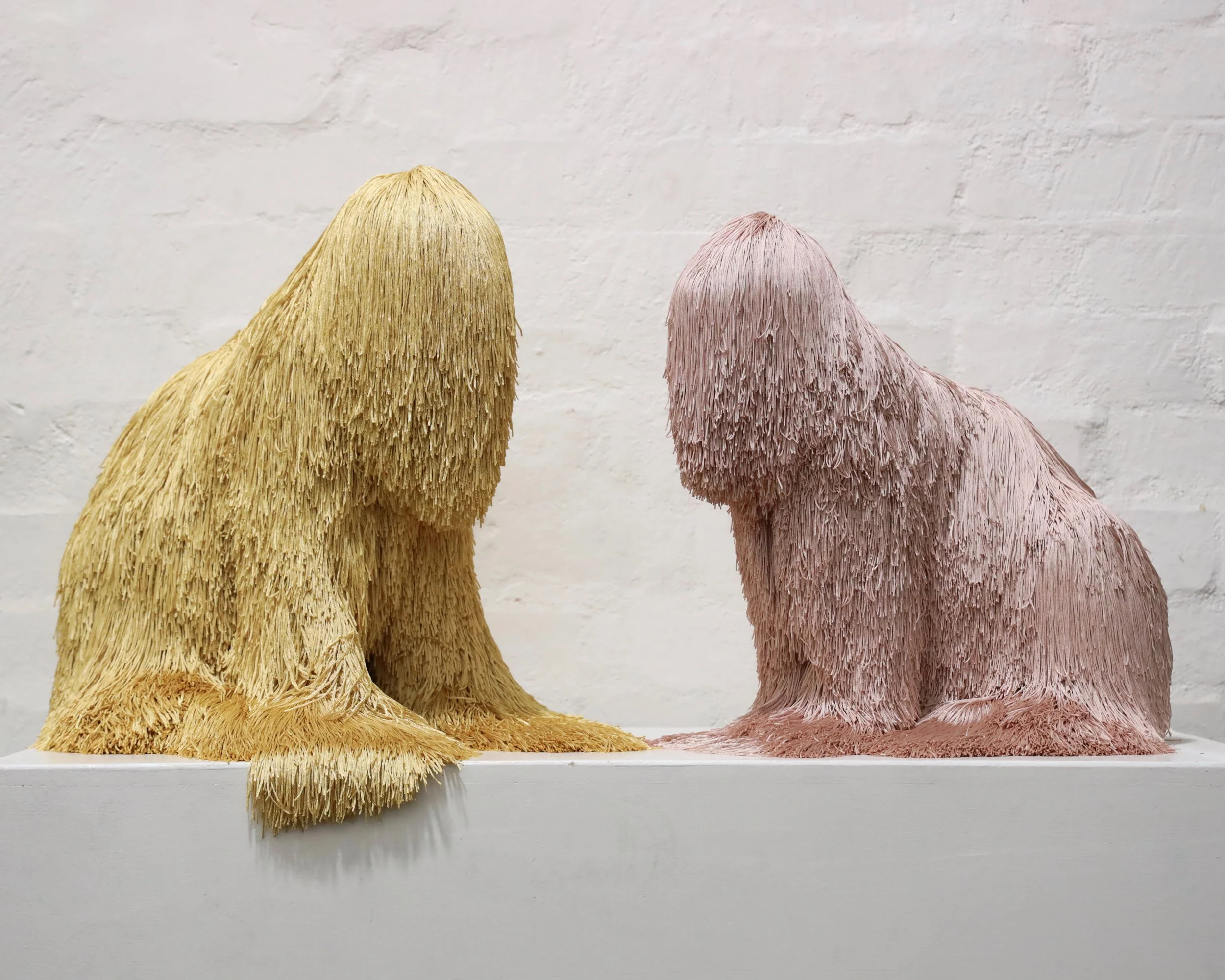  gold game, polyester, polyurethane, pins, adhesive, 48 x 50 x 39 cm, 2019 (left)  sweet lady, polyester, polyurethane, pins, adhesive, 43 x 49 x 30 cm, 2019 (right) 