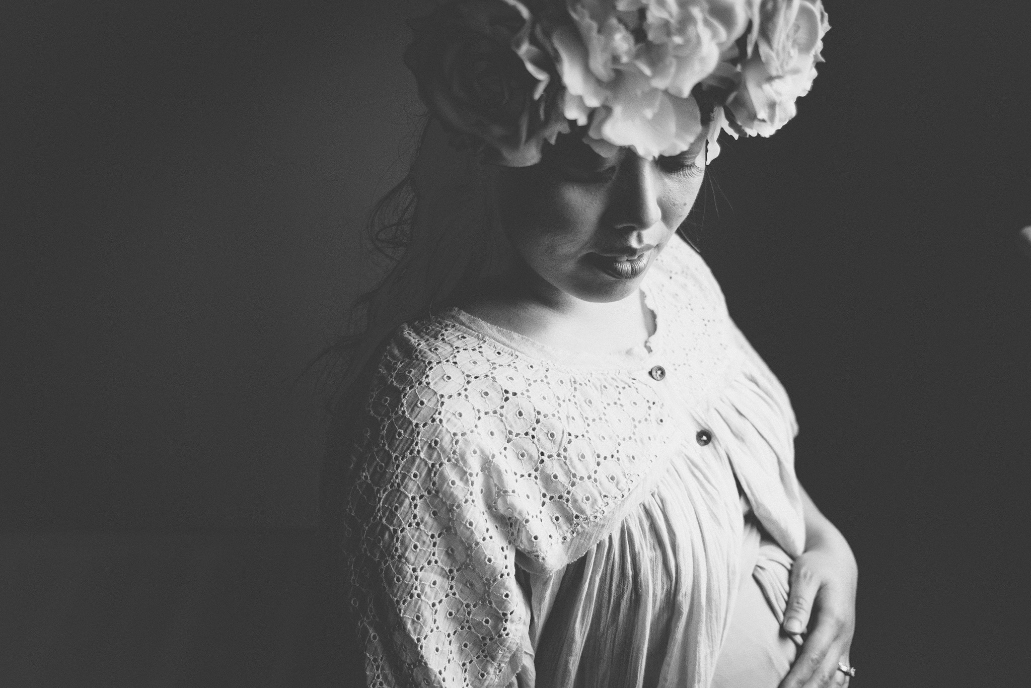 This was taken inside of the baby's nursery. Cute right? Only the nursery is very unfinished. We are standing in an unfurnished room with ladders and tools and paint buckets and dust. We started shooting in another part of the house but I liked the light in this room more. 