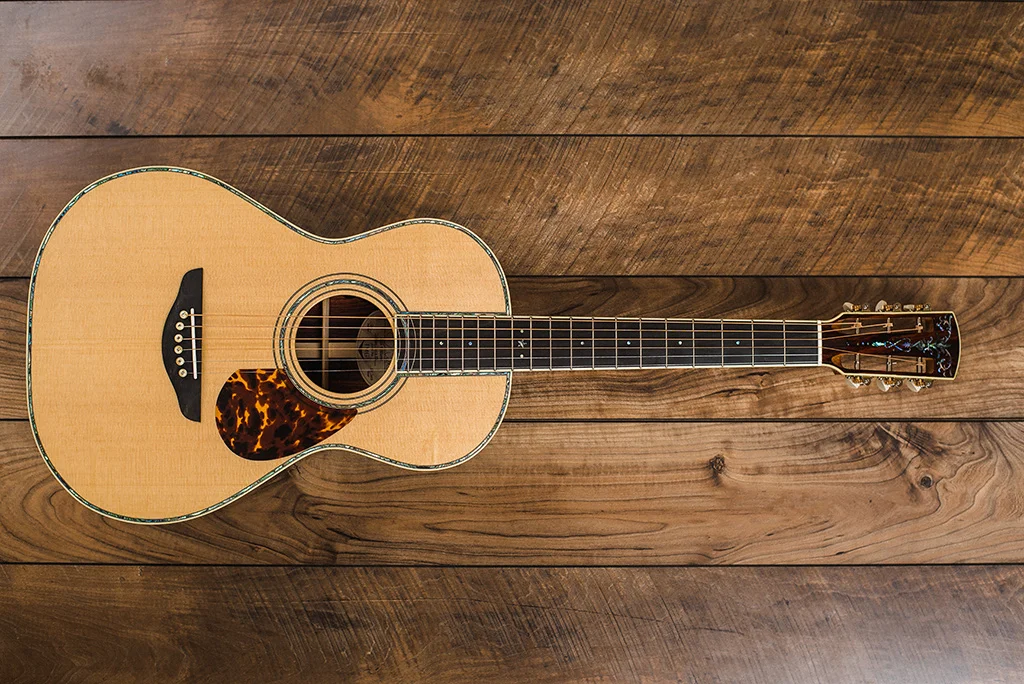 Above: OO Signature Series Sitka Spruce/Cocobolo w/upgraded inlay and slotted headstock