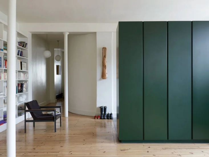 That green on the doors of the cupboard. Apartment makeover by Regis Larroque