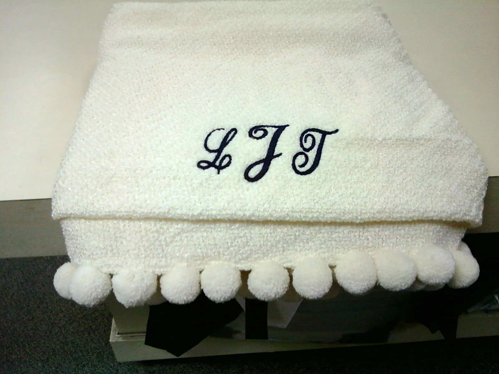Embroidered initials on towels