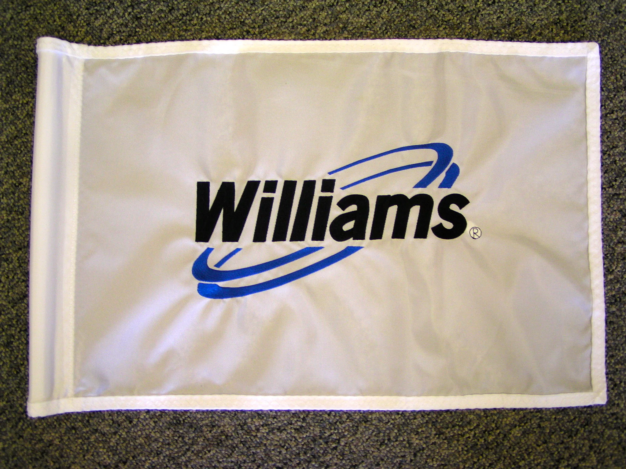 Embroidered logo on golf flag.