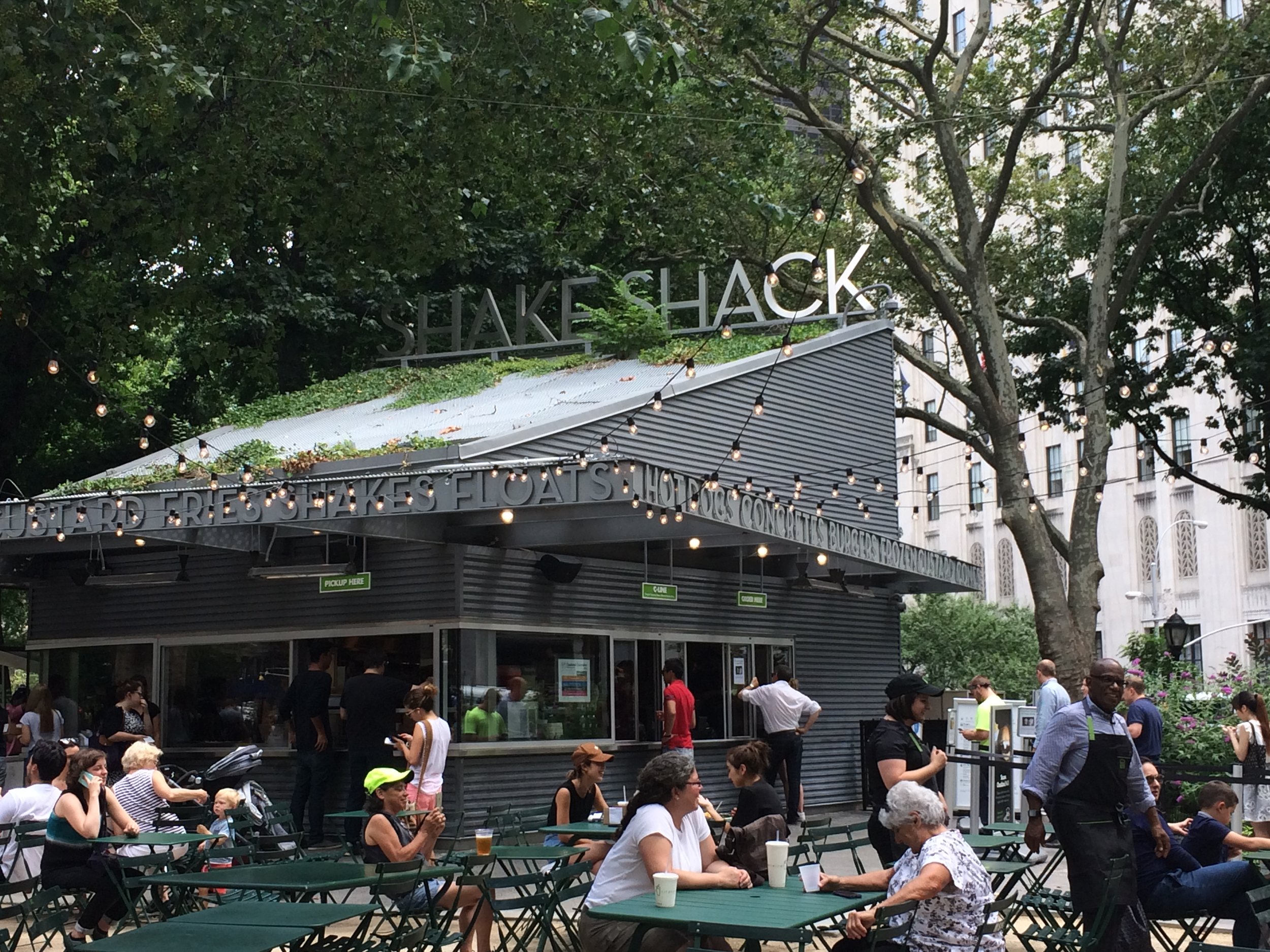 That's Al Roker in the bottom right corner, getting ready to hand out samples of his Roker Burger to Shake Shack customers in Madison Square Park.