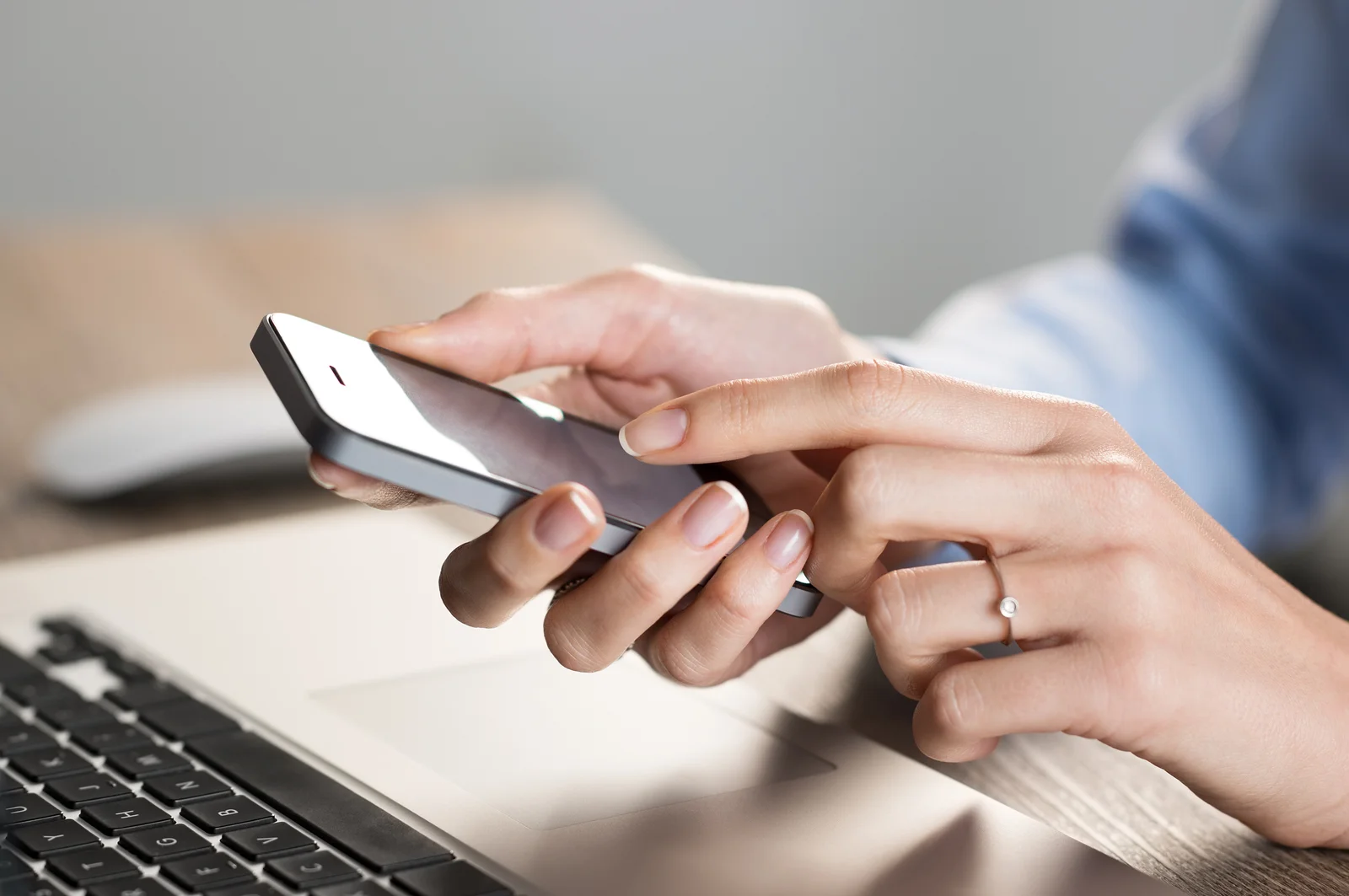 Customer using a smart phone to contact customer service.