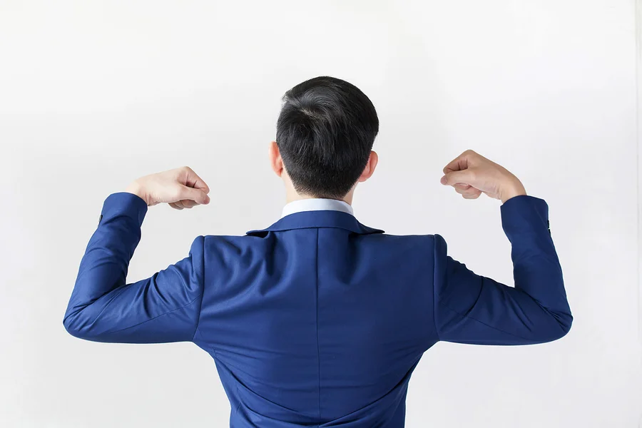 An empowered employee flexing his muscles.