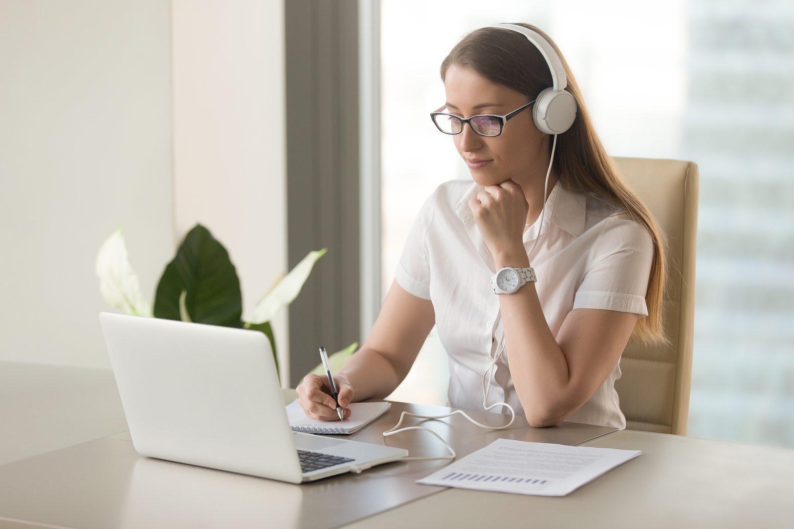 Employee watching a training video on a computer.