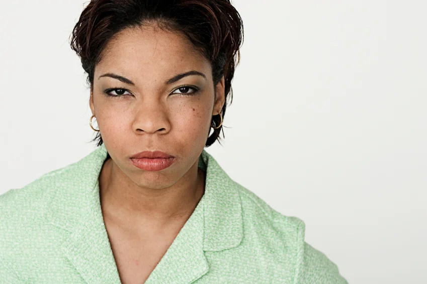 Upset, scowling employee.