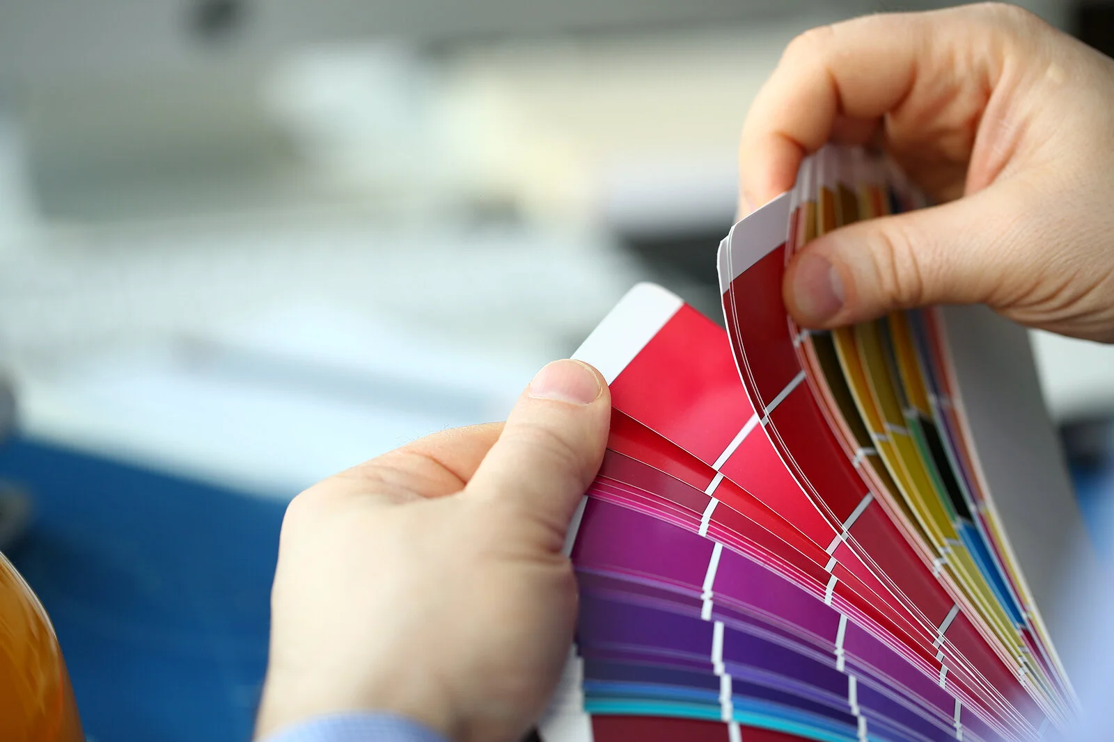 A customer is searching for their favorite paint color.