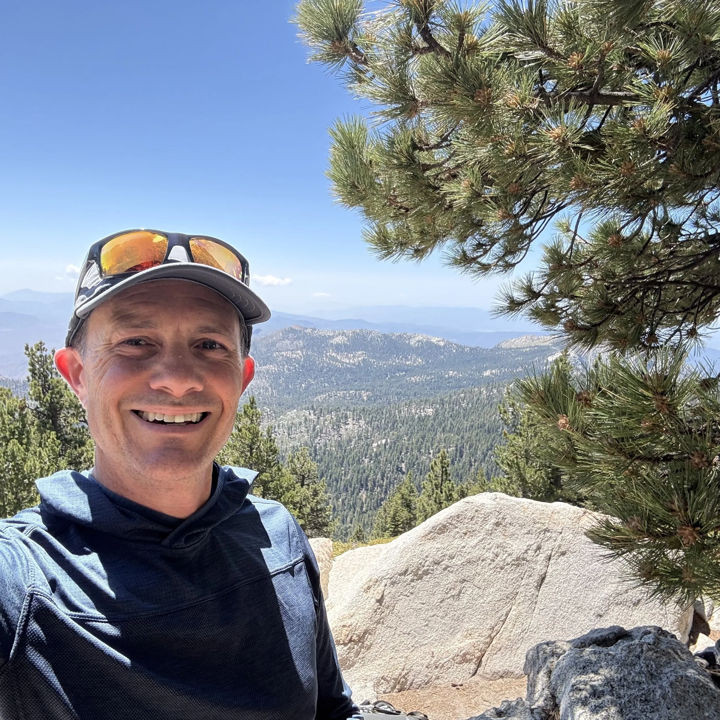 Jeff Toister on top of a mountain.