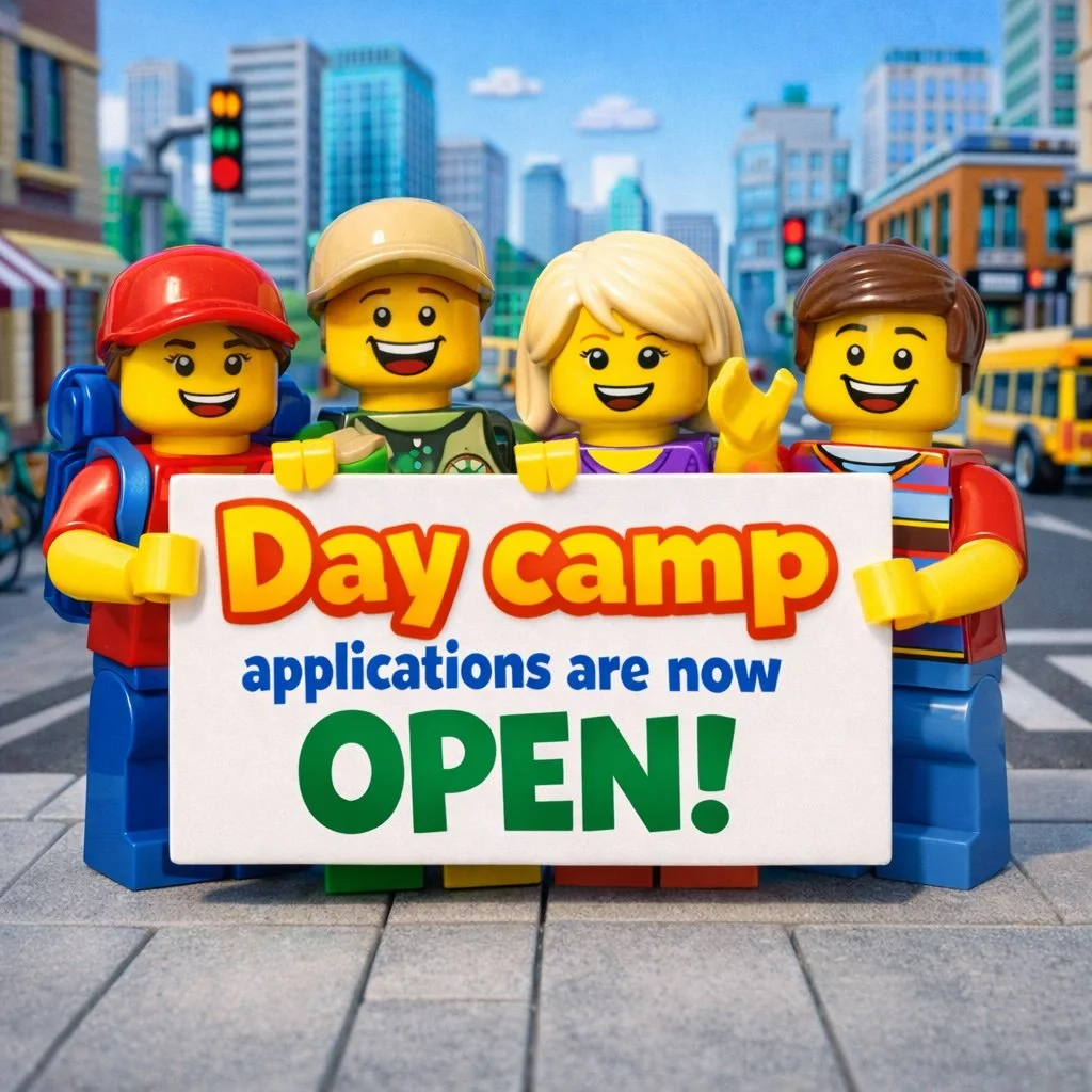 LEGO minifigures  holding sign  saying "Day camp applications are now OPEN!"