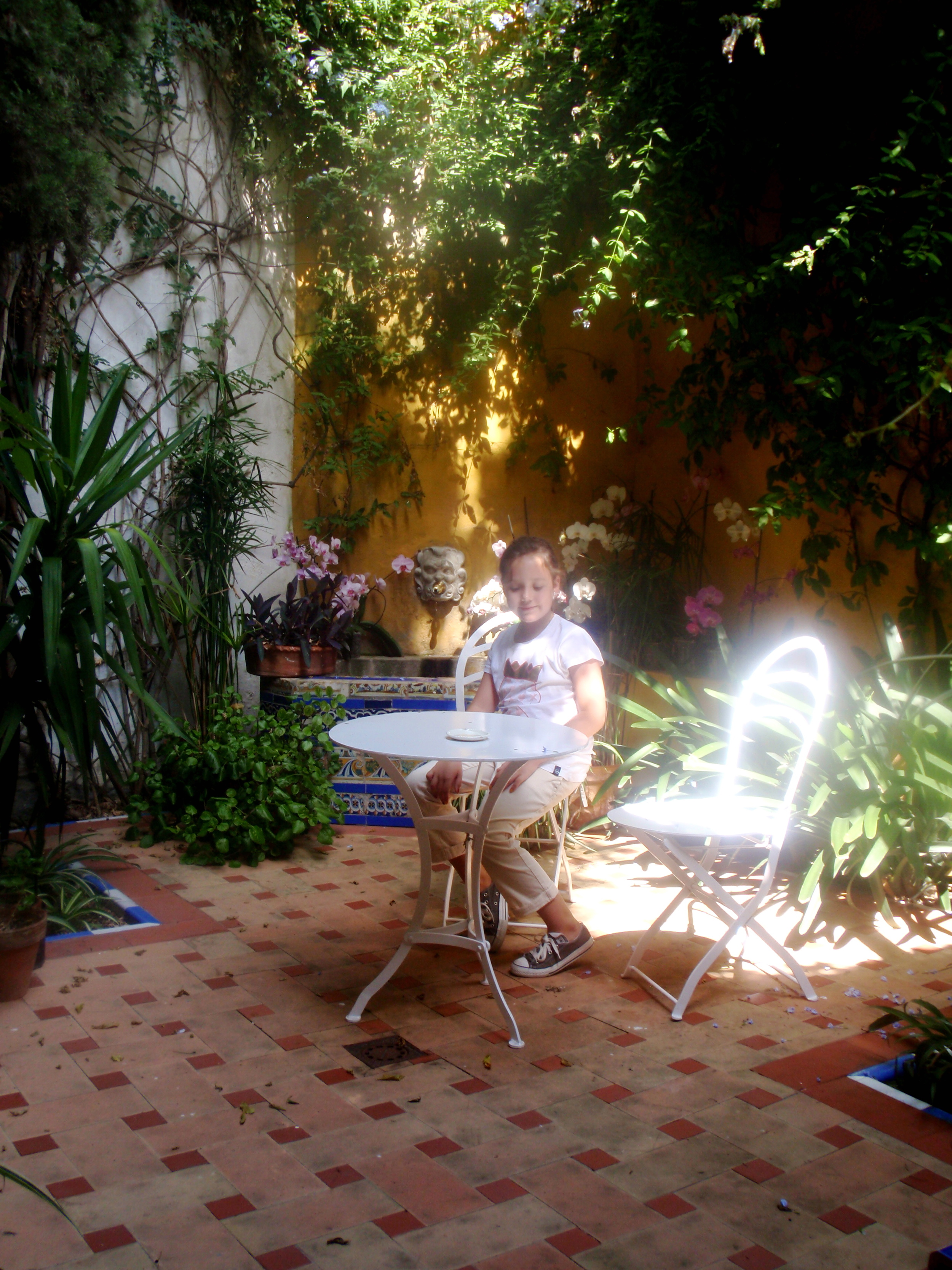Sloane and "the spirit" in a courtyard in La Juderia, Seville, Spain. 