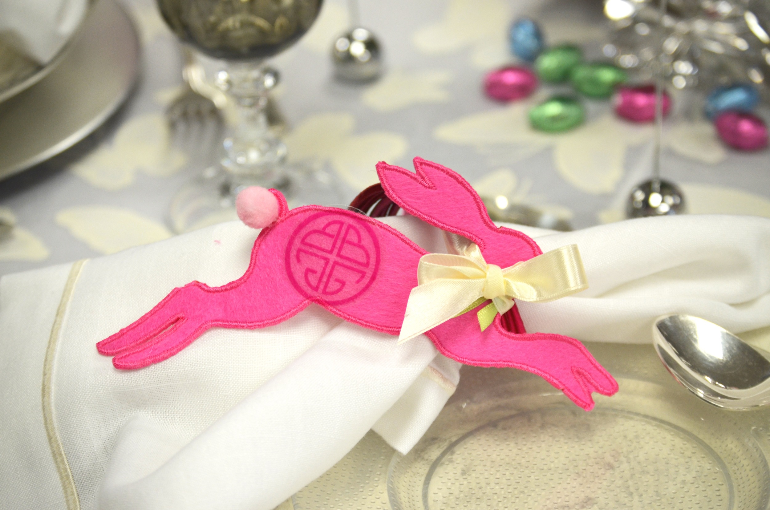 Napkin rings are personalized with a BuDhaGirl bunny and a set of pink chakra bangles for each guest.