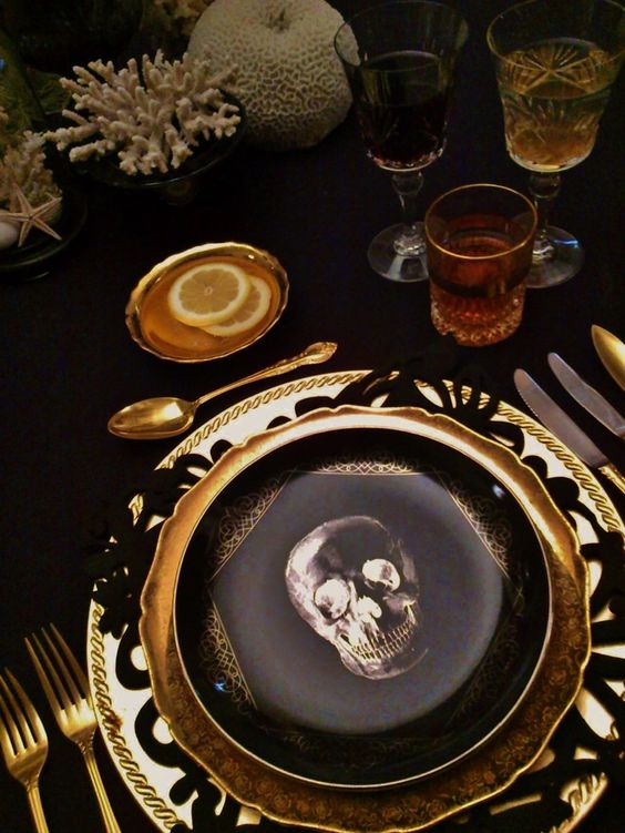 Create a cabinet of curiosities theme on your table by decorating with natural oddities such as shells and skulls.