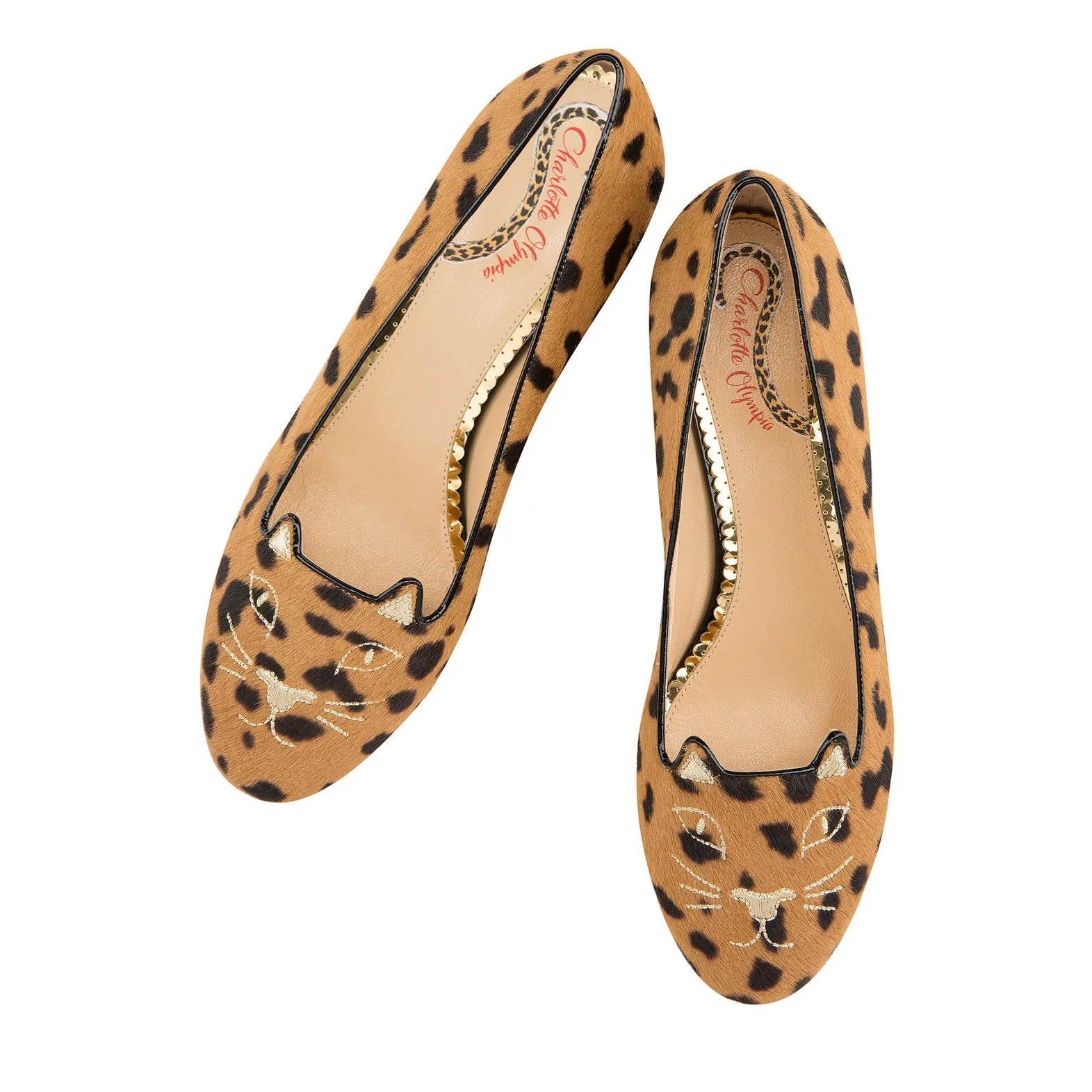 A must-have pair of Charlotte Olympia kitty flats . Don't know about you, but we think these gold details would go perfectly with a set of All Weather Bangles . 