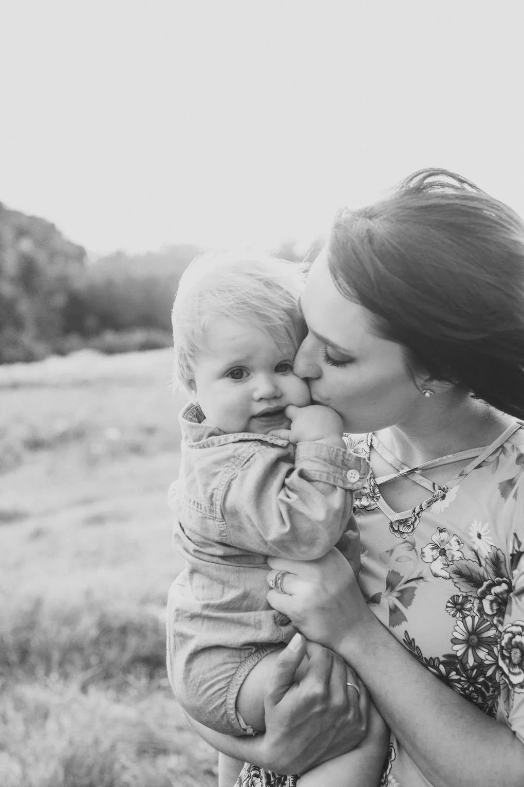 Mom Kissing Baby Boy.jpeg