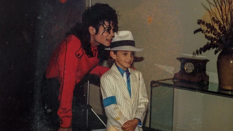 Jackson with 7-year-old Wade in the early 90s