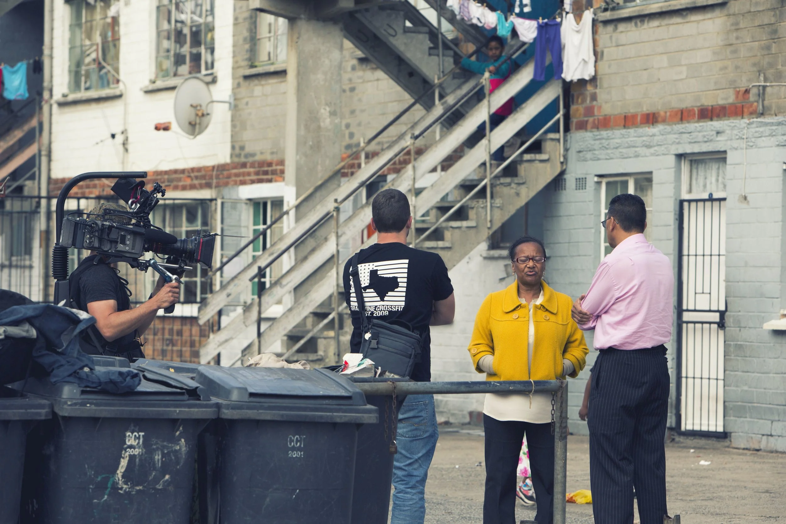 Allan and Dustin interviewing a woman in the Lavender Hill neighborhood of Cape Town, a government housing project where many inmates at Pollsmoor grew up. 