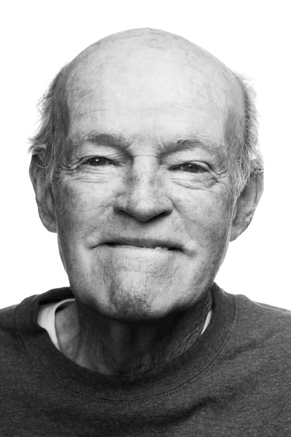Man on white background, studio photography, black and white portraits, senior citizen