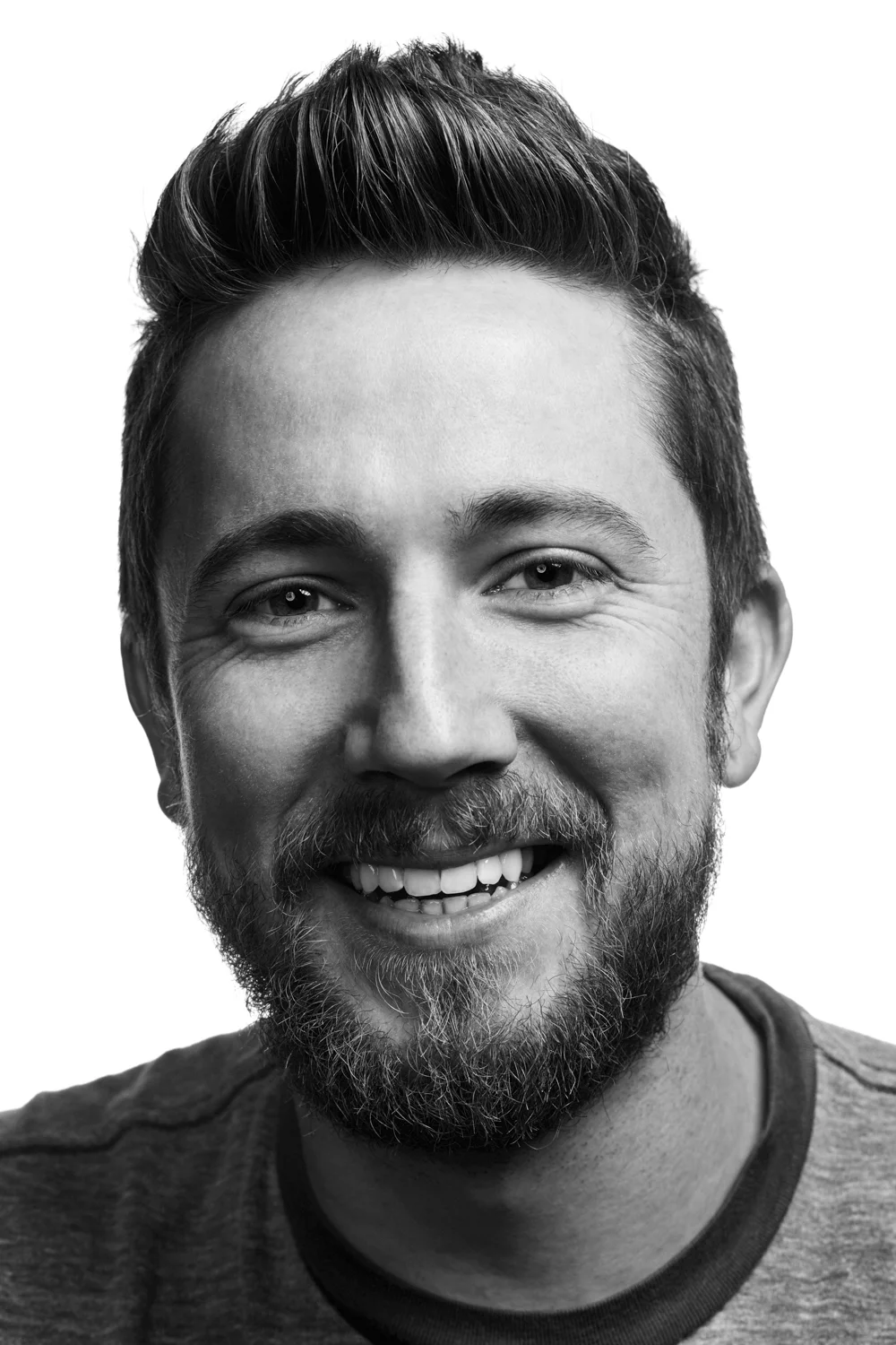 Man on white background, studio photography, black and white portraits