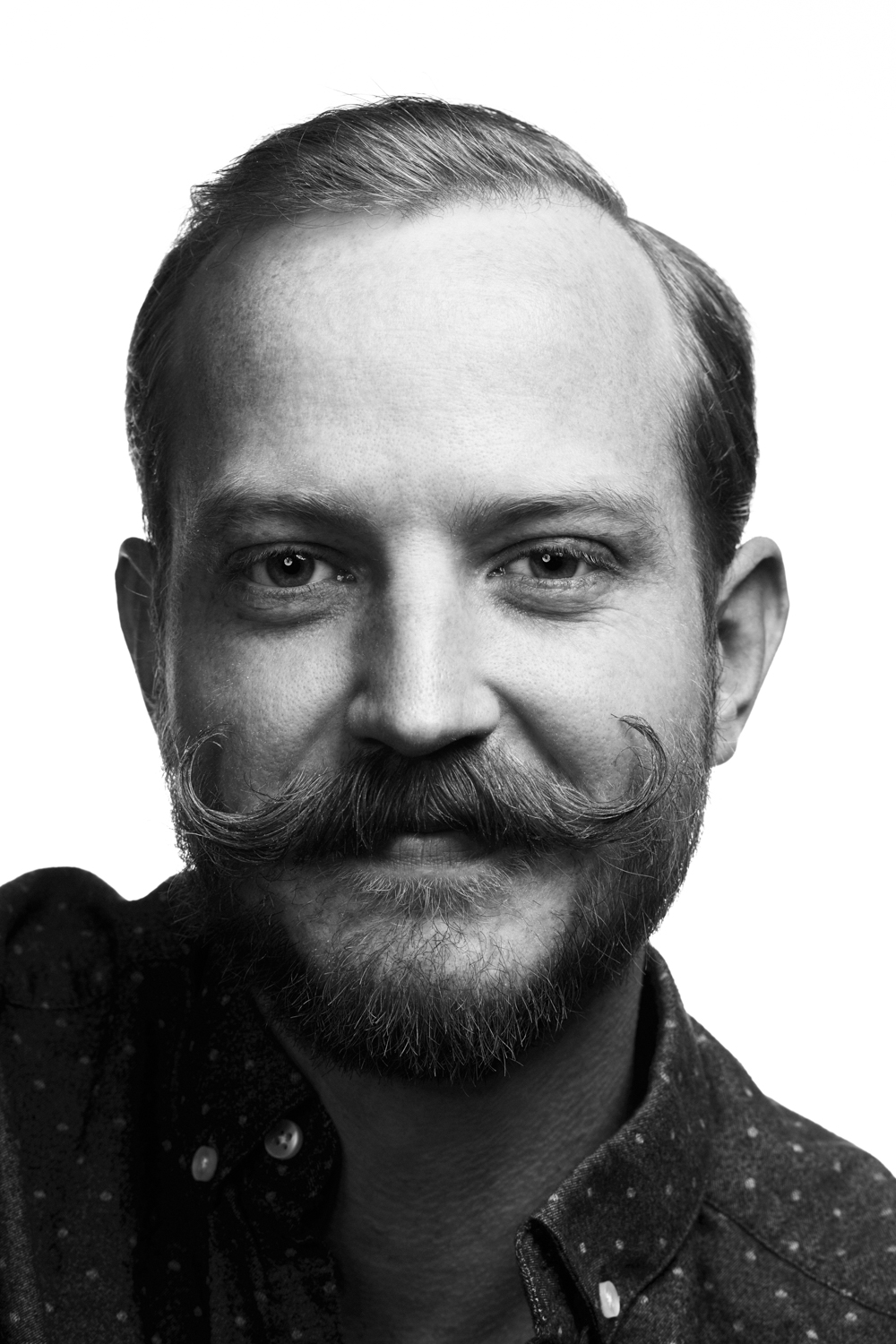 Man on white background, studio photography, black and white portraits, hipster with mustache