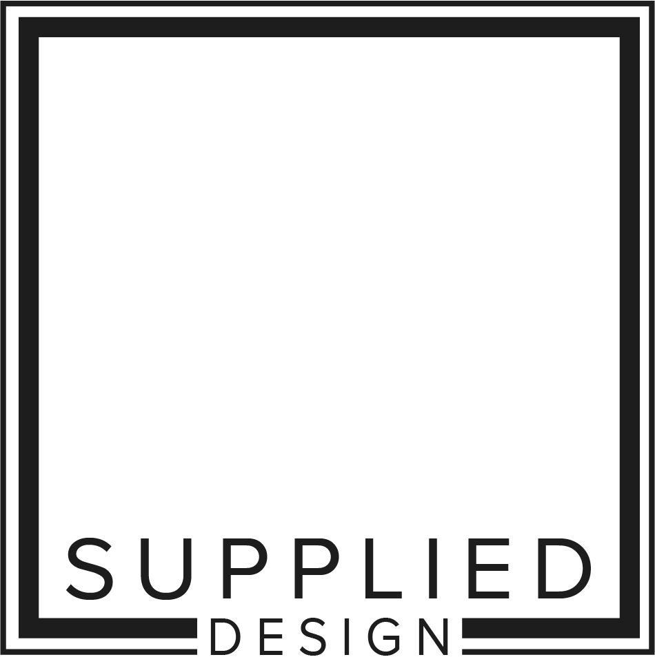 Logo with black borders, the word 'SUPPLIED' in large letters and 'DESIGN' in smaller letters below.