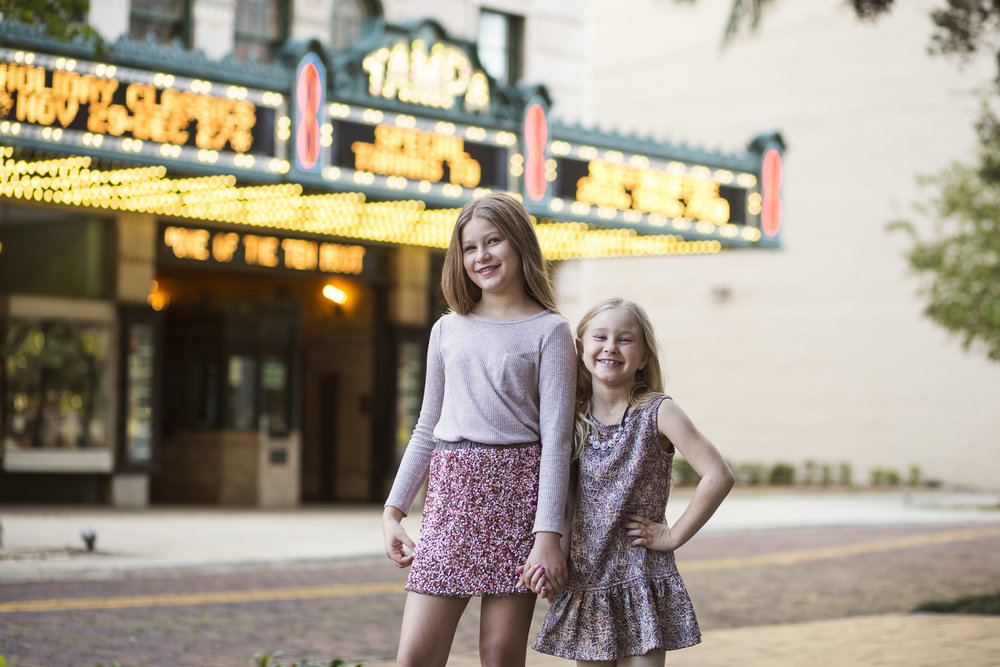 Girls in front of Tampa Theater