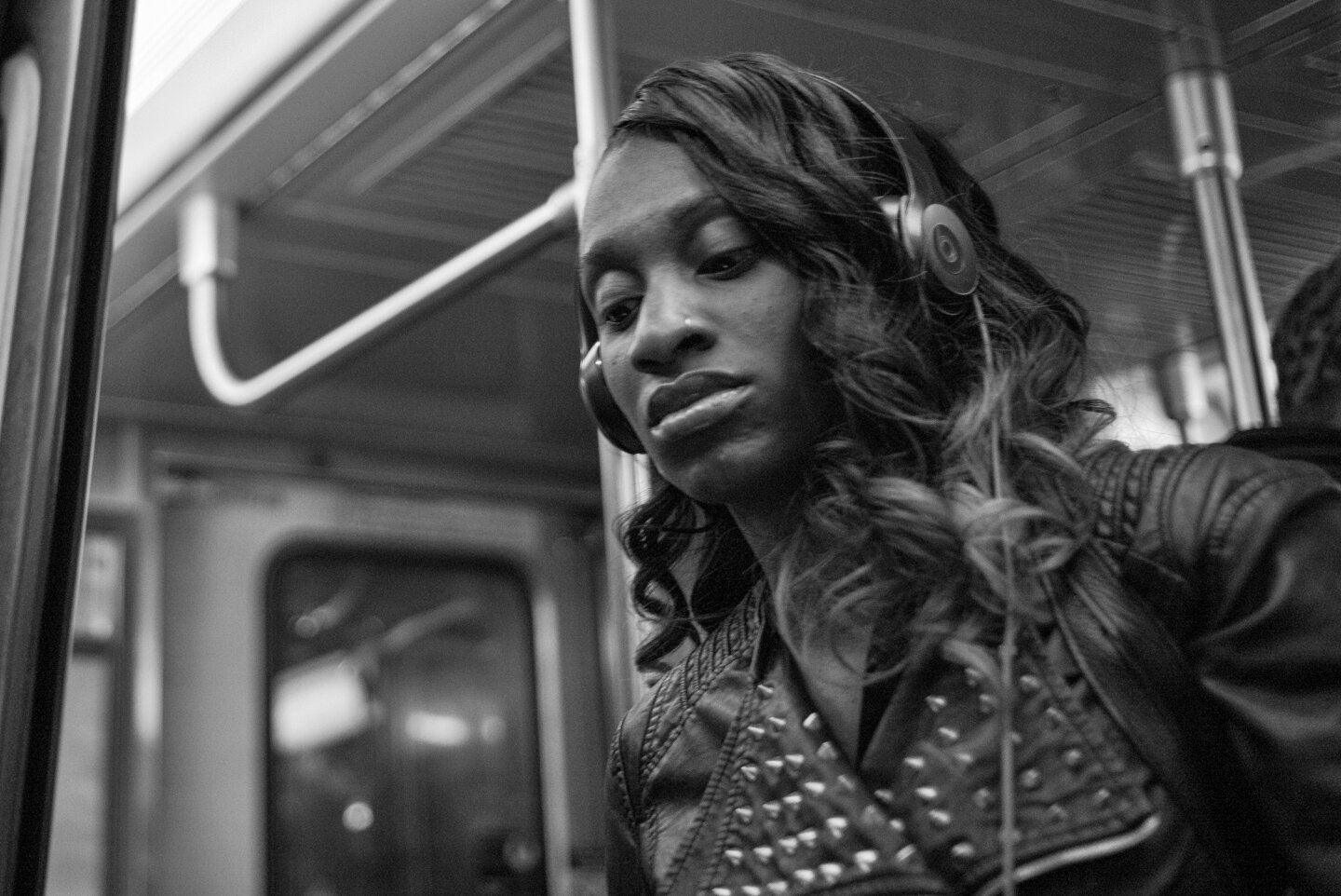 Woman with Headphones. Hunters Point, New York 2015