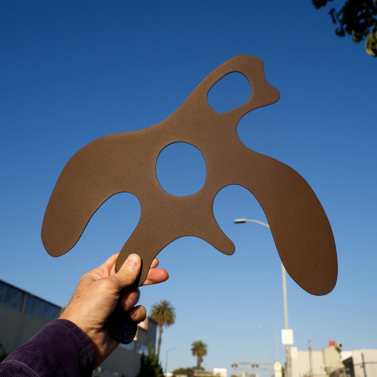 Looking at the new color on an individual piece outside American Steel Studios.