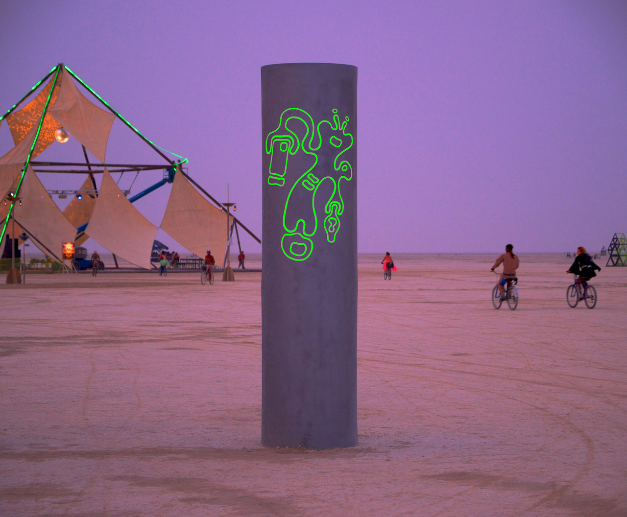 At Burning Man 2013 the color was a nickel silver to go along with that year's theme of Cargo Cult. We were happy with them and they looked awesome, but our new darker color allows the image stand out more during the day.